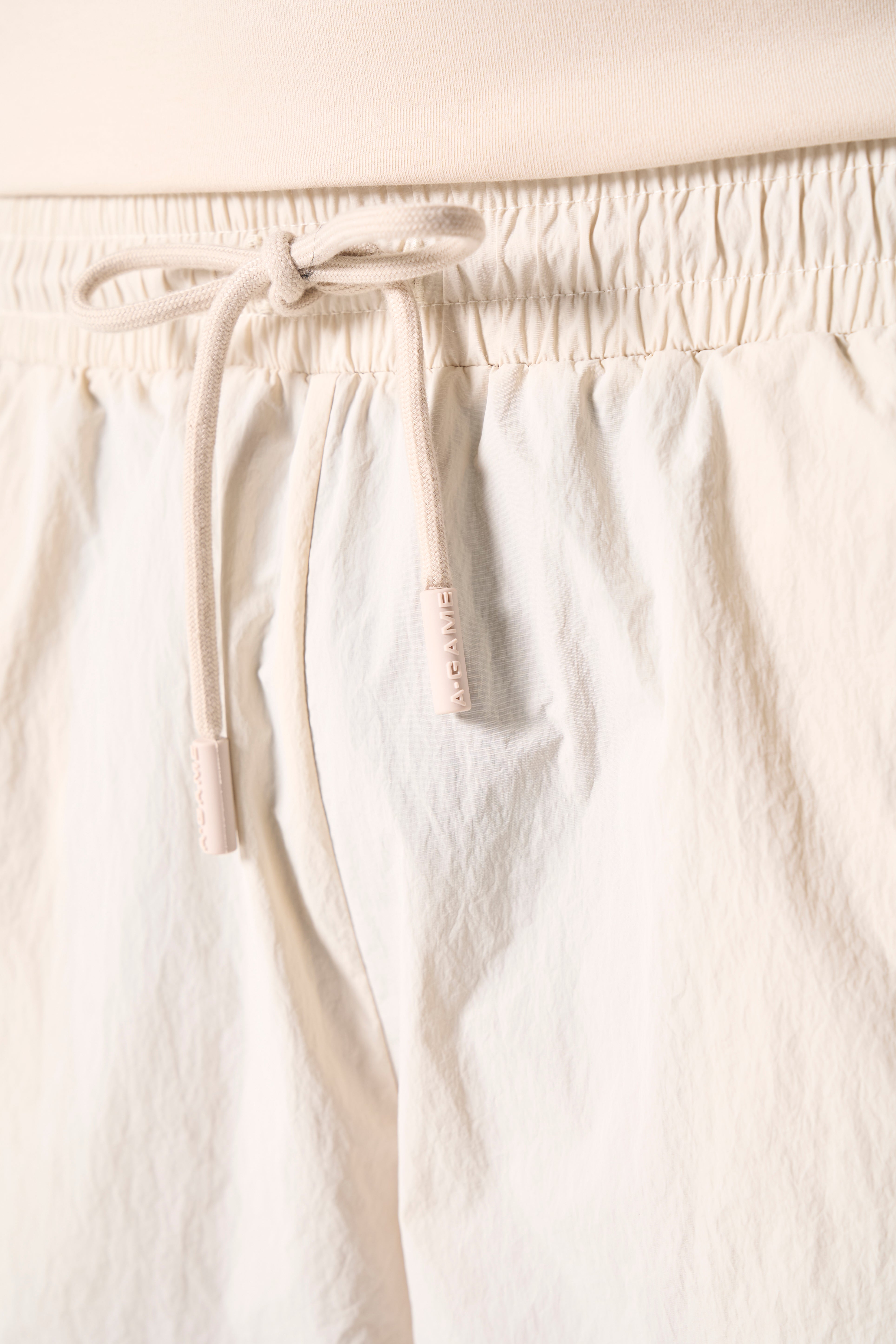 Men's Woven Tech Popper Pants - Beige