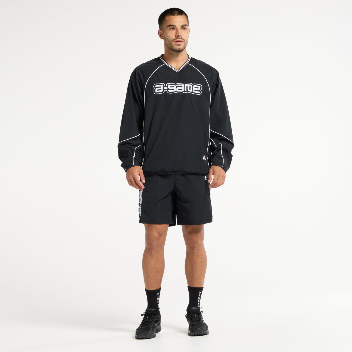 Men's Woven Tech Top - Black